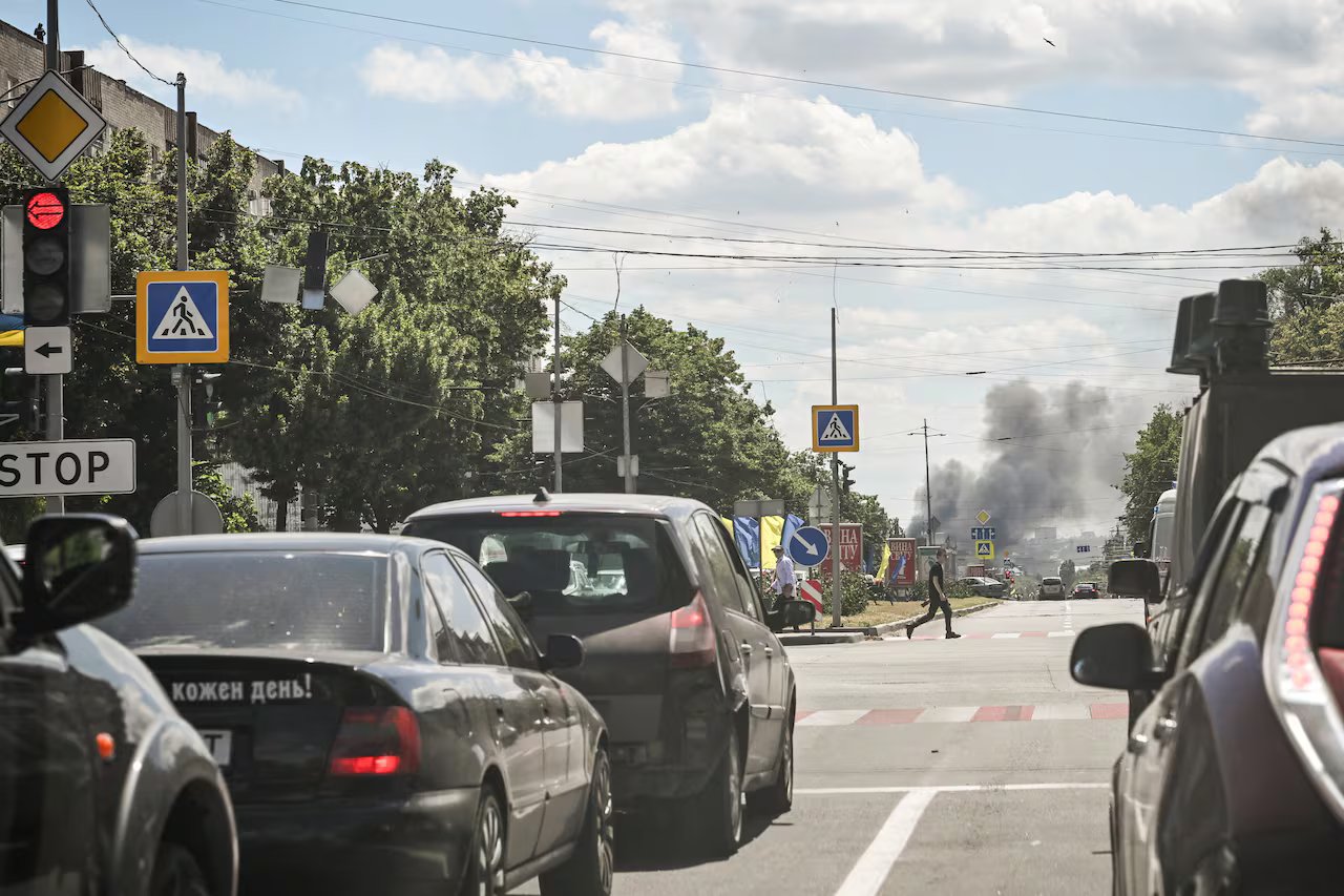 Smoke rises in Zaporozhye, Ukraine, after a Russian military strike.