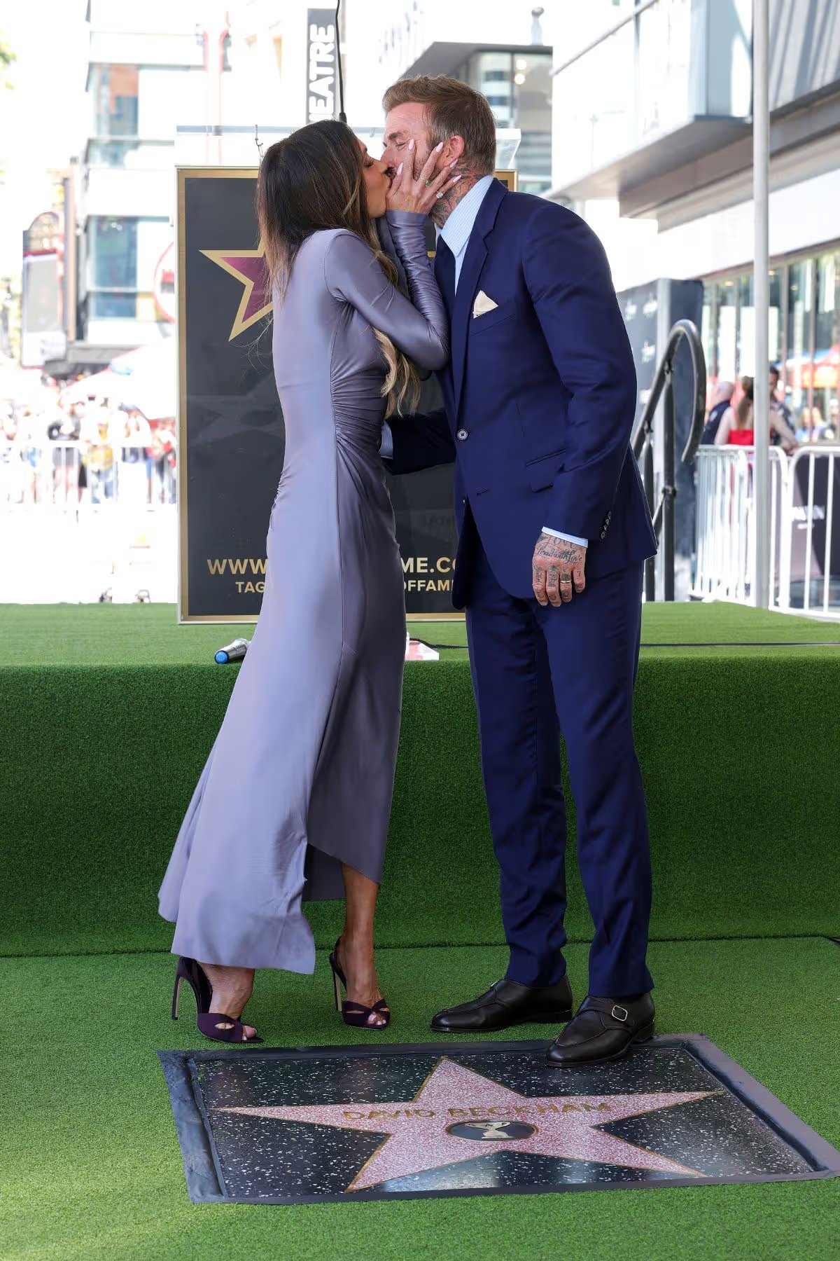 David and Victoria kiss as he receives his star on the Hollywood Walk of Fame.