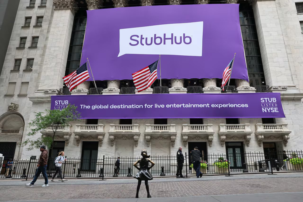 A massive purple Stubhub banner hangs outside the white building.