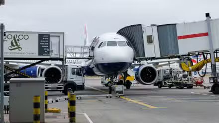 British Airways plane at the gates of London Heathrow Airport