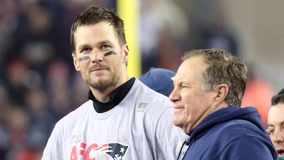 New England Patriots quarterback Tom Brady stands with head coach Bill Belichick at Gillette Stadium.