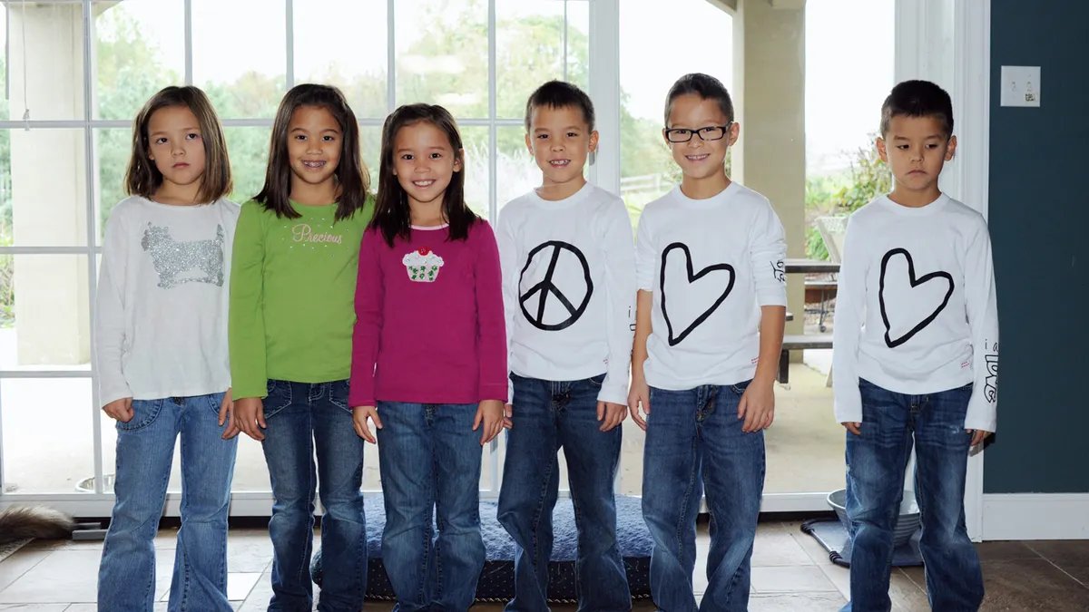 Gosselin's children sit together on the set of Celebrity Wife Swap.