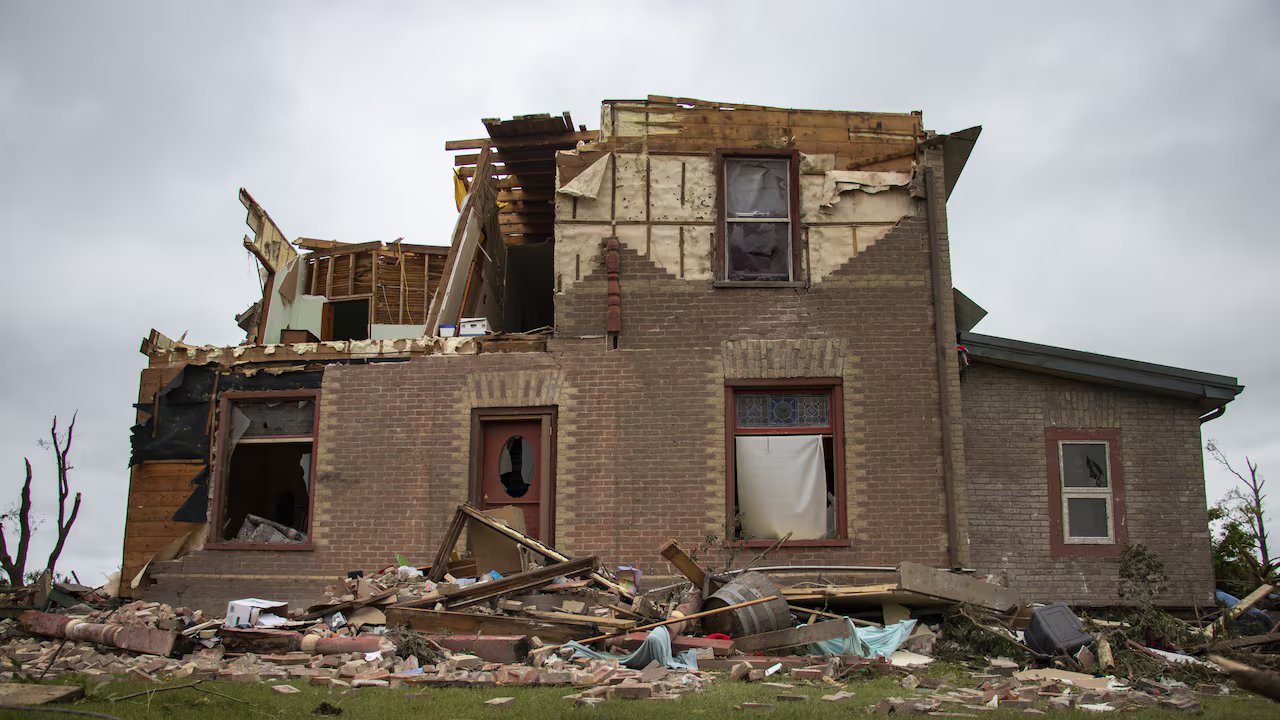 Heavily damaged brick house