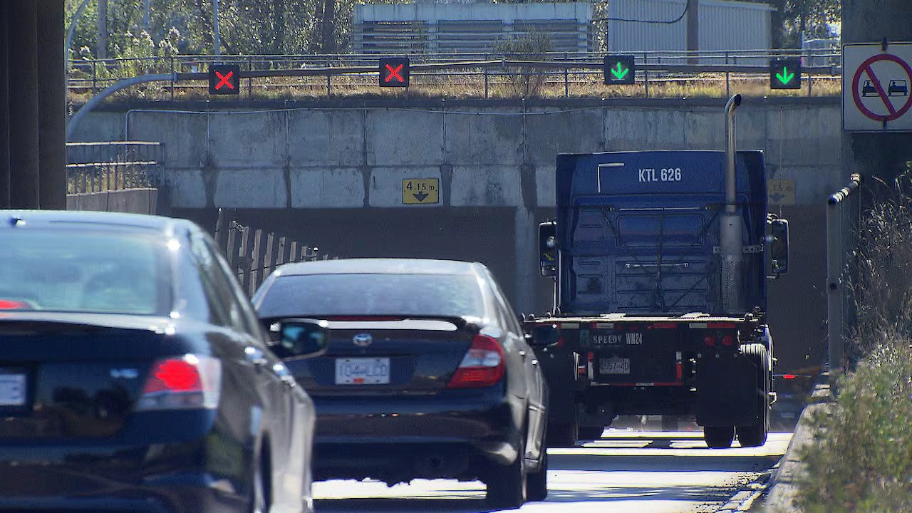 Cars enter the tunnel