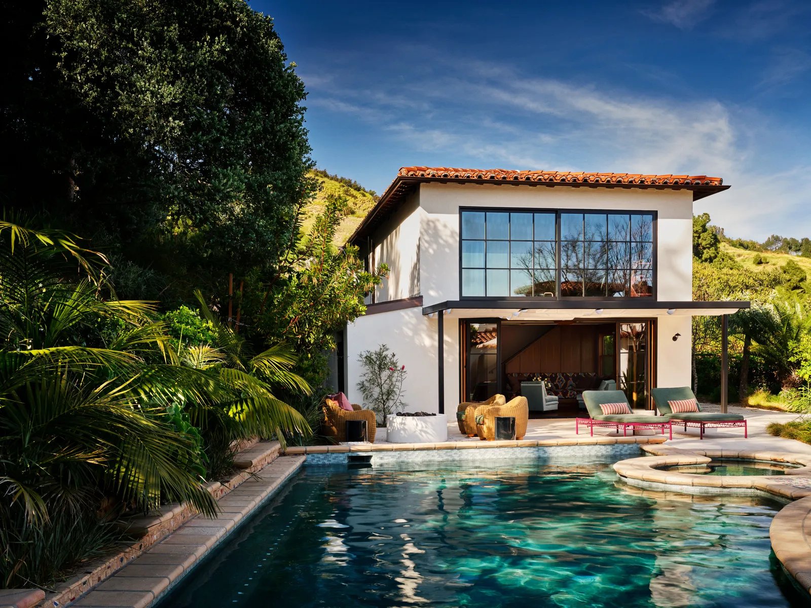Image may contain Architecture Building House Housing Villa Pool Water Pool and Outdoors