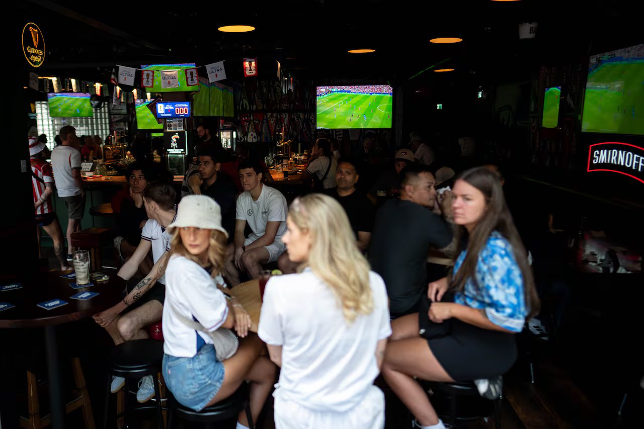 People spend time on Granville Street during the World Cup in Vancouver, British Columbia, Wednesday, June 17, 2026.