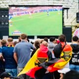 Sunday shopping in Vietnam: where is July 5th? shops open 18 Football fans stand in front of a screen during a public screening in Dortmund's port garden.
