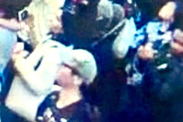 Police have obtained CCTV footage of childcare worker David James (far right) being abused in Chatswood.