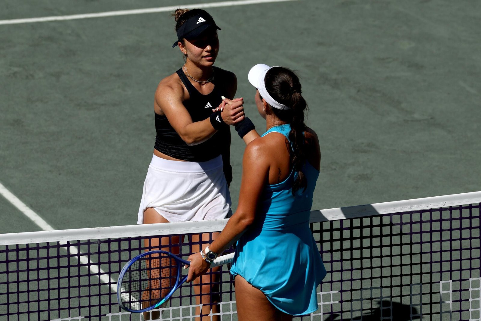 Iva Jovic hopes to beat Jessica Pegula at Wimbledon 13 Torrance native Iva Jovic congratulates American Jessica Pegula after Pegula won their match.
