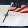An information packet and an American flag lie on a chair at the U.S. Citizenship and Immigration Services Miami field office on August 17, 2018 in Miami.