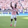 USA forward Folarin Balogun will be in the squad for the World Cup round of 16 match against Belgium on Monday. FIFA's disciplinary committee suspended his one-game ban following his controversial red card against Bosnia and Herzegovina on Wednesday in Santa Clara, California.