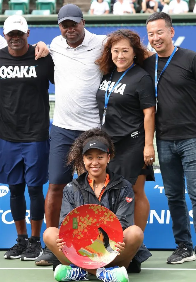 Leonard Francois and Tamaki Osaka with Naomi Osaka in 2019. Photo: Yoshio Tsunoda/AFLO/Alamy