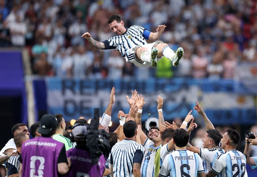 How Lionel Messi and Argentina sent the World Cup into sports nirvana 19 Lionel Messi is thrown into the air by his teammates during celebrations.