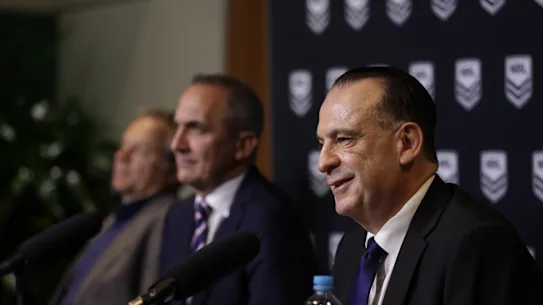 Australian Rugby League Commission Chairman Peter W'Landys (foreground) flanked by outgoing NRL CEO Andrew Abdo and Nine chief executive Matt Stanton (left).