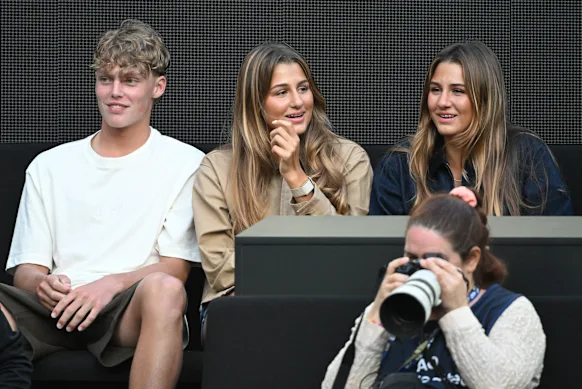 Cruise Hewitt with Maila and Charlene Federer at this year's Australian Open. They supported him at Wimbledon.