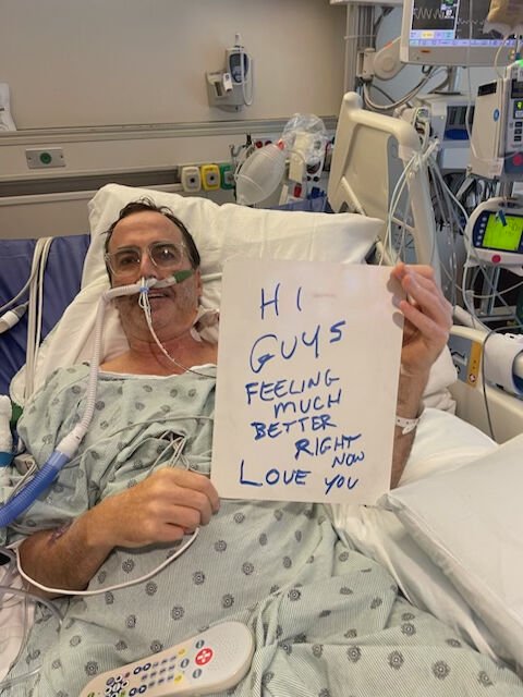 Rare transplant gives stage 4 lung cancer patients a second chance at life - Capitol Hill man is proof 15 Peterson holds a sign on his hospital bed that reads:
