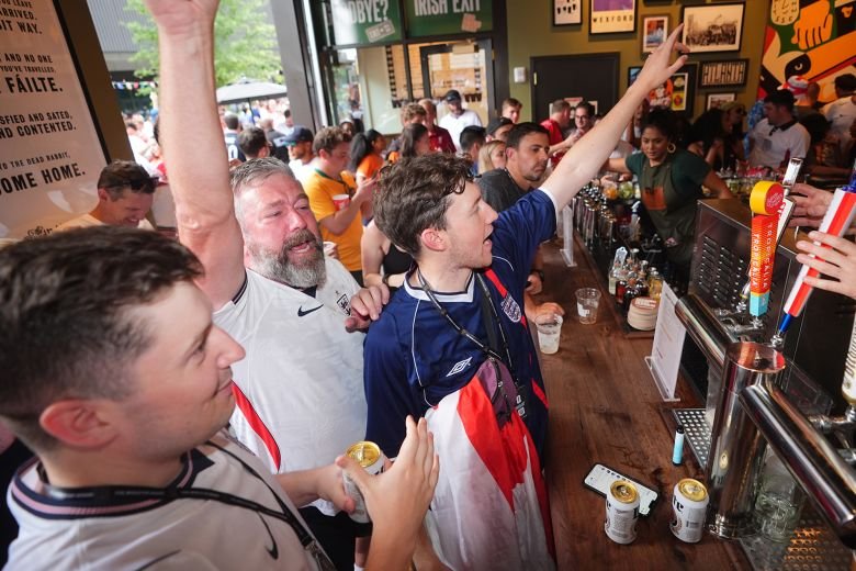 The USA and Mexico are not participating in the World Cup. Ticket prices are falling 14 England fans celebrated in an Atlanta bar last week.