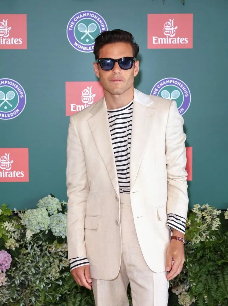 Rami Malek attends as a guest of Emirates Airlines, an official partner of the 2026 Wimbledon Championships, at the All England Lawn Tennis and Croquet Club on July 10, 2026 in London, England. (Photo by Hoda Davaina/Getty Images for Emirates)