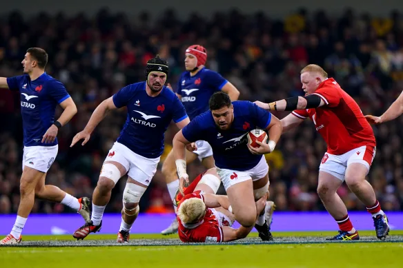 Emmanuel Mafu takes a break for France against Wales.