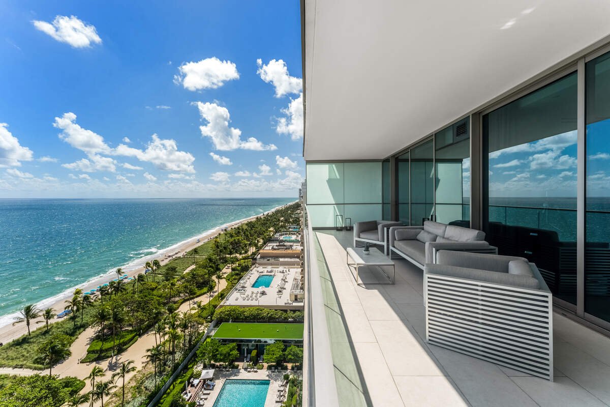East-facing balconies offer views of the Atlantic Ocean as well as the apartment building's two pools.