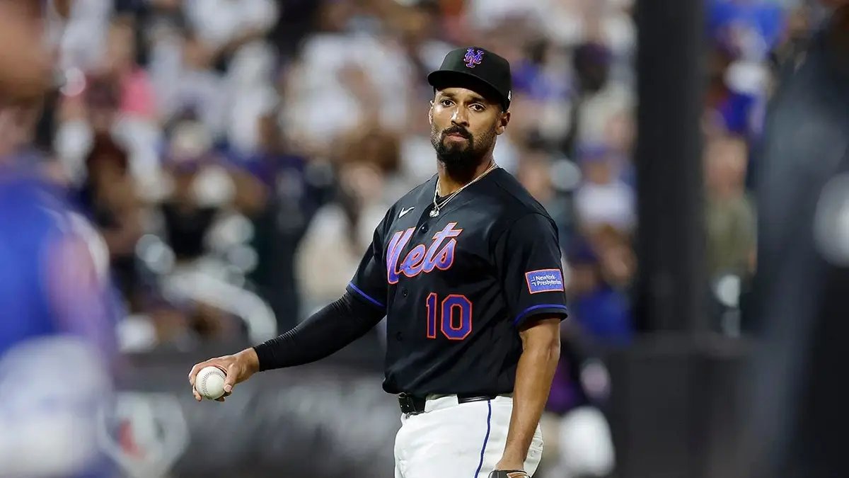 A new report suggests the New York Mets are open to trading Francisco Lindor amid a disastrous season. 15 Marcus Semien of the New York Mets holds a baseball at Citi Field.
