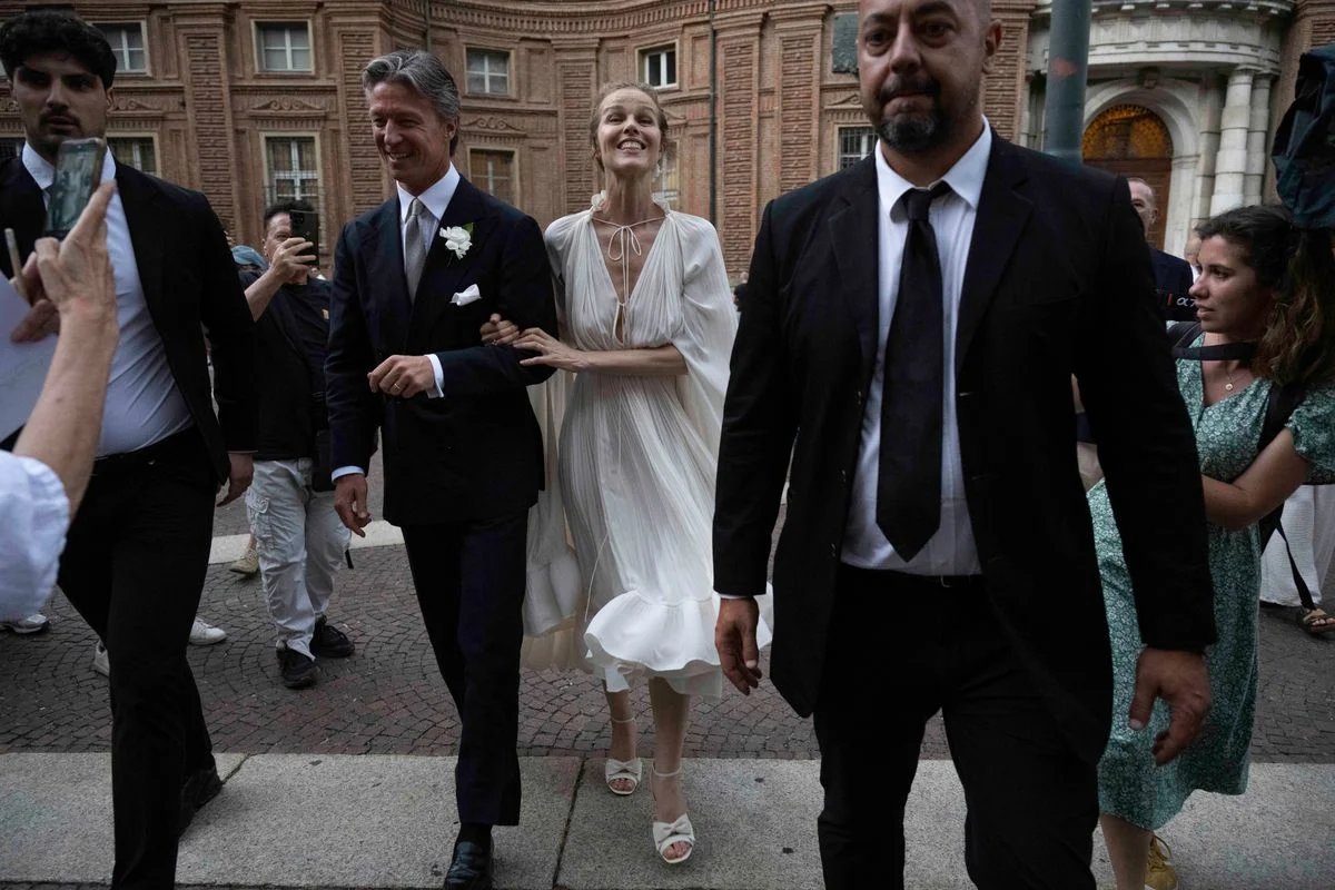 The couple exchanged vows in an intimate wedding ceremony attended by about 50 family members and close friends.