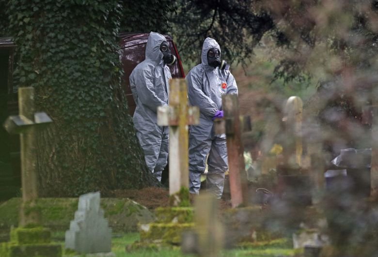 Salisbury poisonings: Charlie Rowley gave his girlfriend what he thought was a fancy perfume. It was actually a Russian nerve agent. 26 Forensic experts wearing gas masks inspect London Road Cemetery in Salisbury, England, in March 2018. The cemetery contains the remains of the wife and son of former Russian double agent Sergei Skripal.