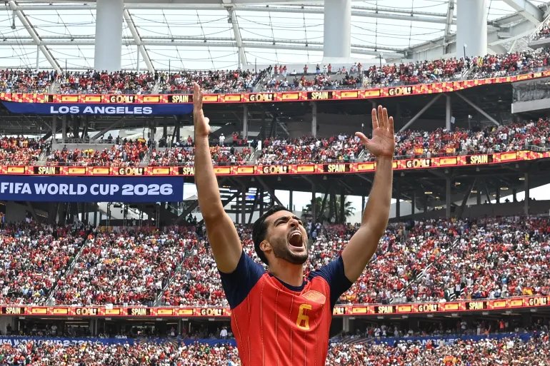 Mikel Merino celebrates scoring his team's second goal against Belgium in the quarter-finals