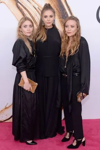 Elizabeth Olsen (center), Mary-Kate and AshleyPhoto: Clint Spaulding/Patrick McMullan/Getty