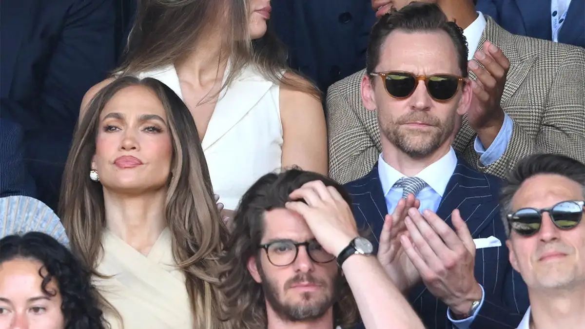 Jennifer Lopez's wide-brimmed hat at Wimbledon sparks backlash on social media 17 Jennifer Lopez and Tom Hiddleston perform together at Wimbledon in London.