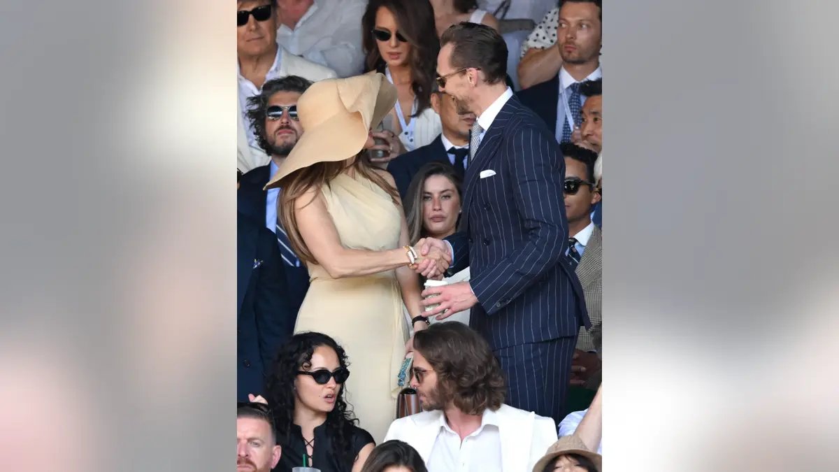 Jennifer Lopez's wide-brimmed hat at Wimbledon sparks backlash on social media 18 Jennifer Lopez and Tom Hiddleston performed together at Wimbledon.