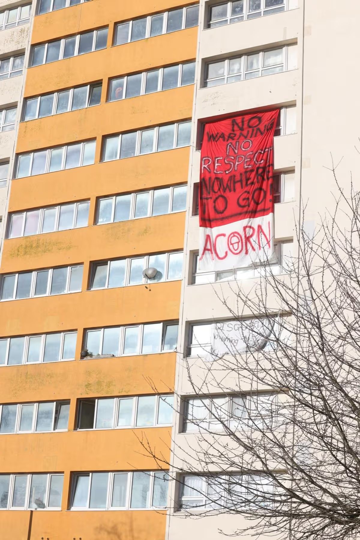 “Systematic failure to listen and respect” residents, council head admits 17 A giant banner fell from the fifth floor window of Barton's house.
