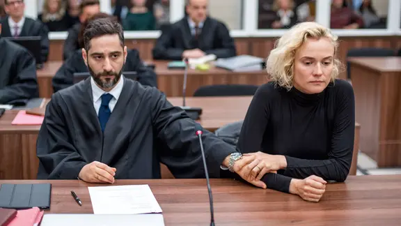 Diane Kruger and Denis Moshitto in a scene from the film in court