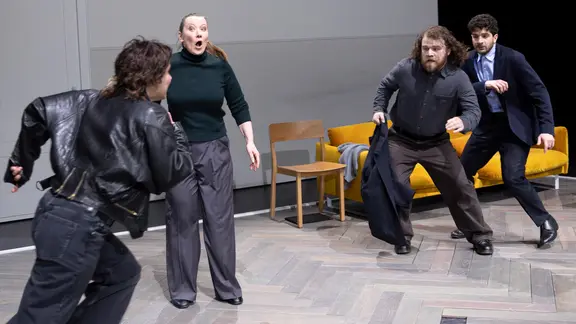 Actors throw themselves at each other on stage