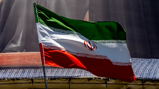 Donald Trump: Strait of Hormuz reverse toll: Why plan to impose 20 percent toll backfired and what it means for US-Iran tensions 22 The Iranian flag flies in Tehran.
