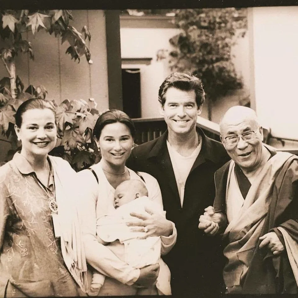 Pierce Brosnan and Keely Shay with the Dalai Lama and their little son
