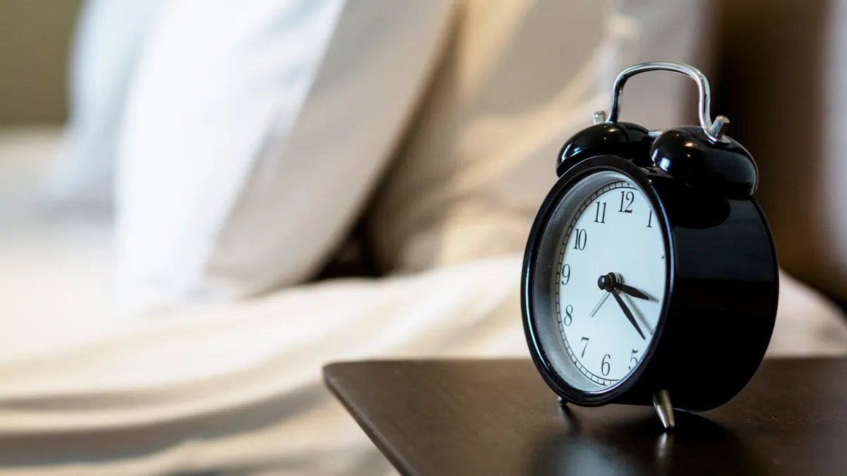 Congress wants to abolish daylight saving time 16 alarm clock on the bedside table