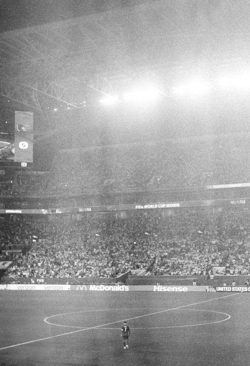 A photograph of Cristiano Ronaldo at the World Cup, taken with a camera from the 1950s.
