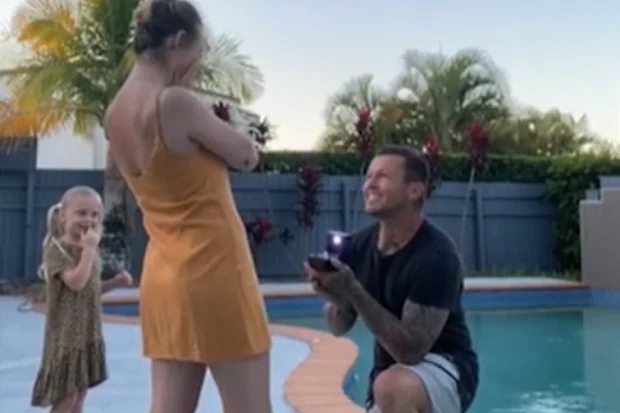 Todd Carney proposes to his girlfriend Susie Bradley.