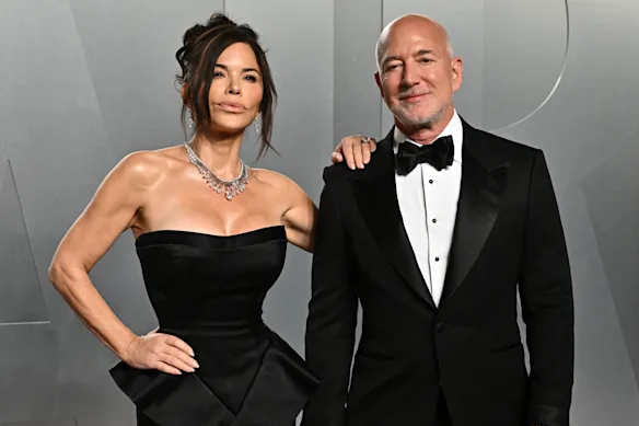 Lauren Sanchez Bezos and Jeff Bezos appear at the Vanity Fair Oscar Party in March.