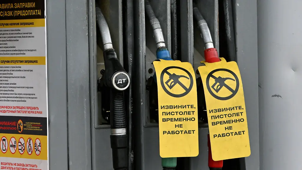 Russia-Gasoline-Shortage-9204503-12-07-2026-Reading-ads-Not in order-visible-at-a gas station-in-Moscow-Russia