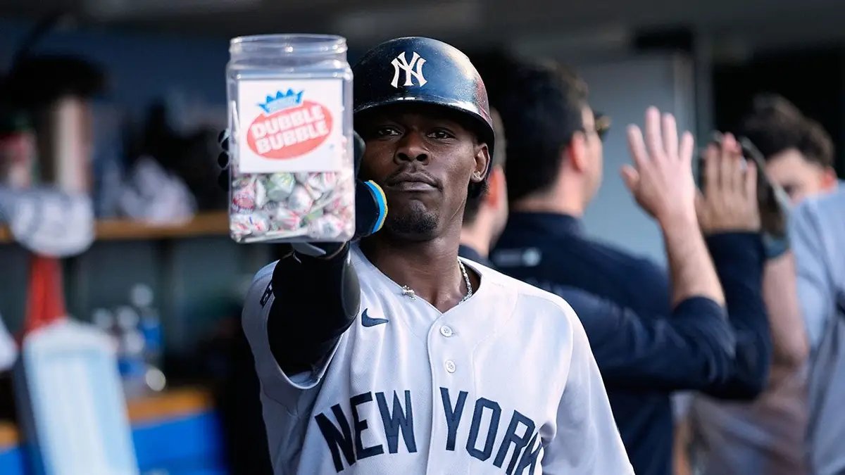 Jazz Chisholm Jr. of the New York Yankees celebrates a home run during a baseball game.