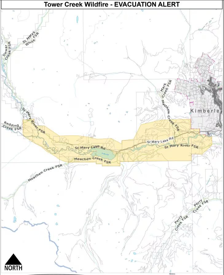 The map shows an evacuation alert area extending west of Kimberley along St Mary's Lake Road and the St Mary's River.
