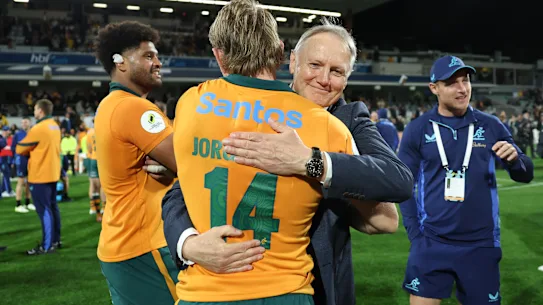 World Rugby is investigating Argentina players after violent confrontation with referee Angus Gardner 18 Schmidt hugs Max Jorgensen after the test in Italy.