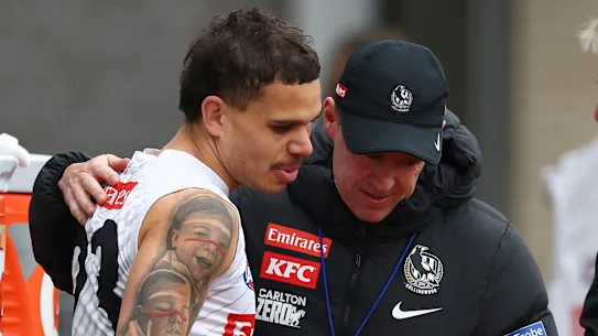 AFL 2026: Hawthorn Hawks will stick with Mitch Lewis as Gold Coast Suns superstar Ben King is set to join him in stunning turnaround 22 Love and care: Bobby Hill with Collingwood coach Craig McRae.
