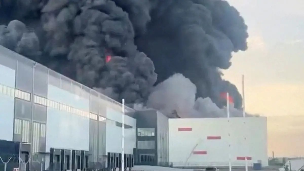 Romanian F-16 shoots down drone in first interception of NATO airspace 17 Smoke rises from the Wildberry facility in Russia