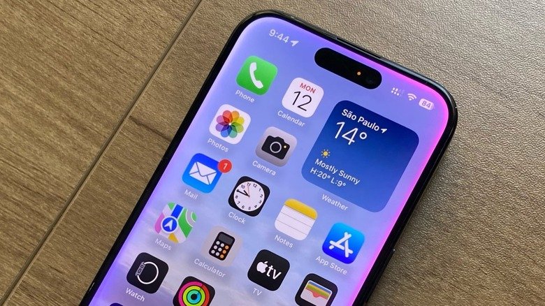 Close-up of an iPhone with the glowing Apple Intelligence sign on the front
