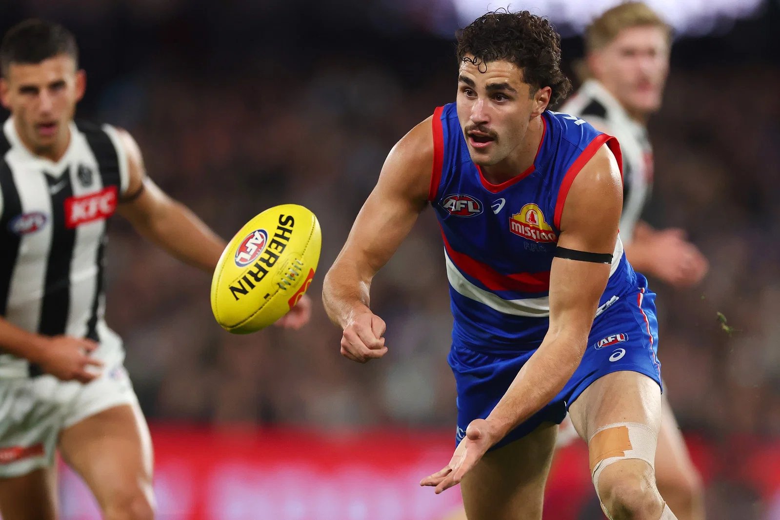 Joel Freya of the Bulldogs handball team during the AFL Round 12 match between the Western Bulldogs and Collingwood Magpies at Docklands on May 30, 2026 in Melbourne, Australia.