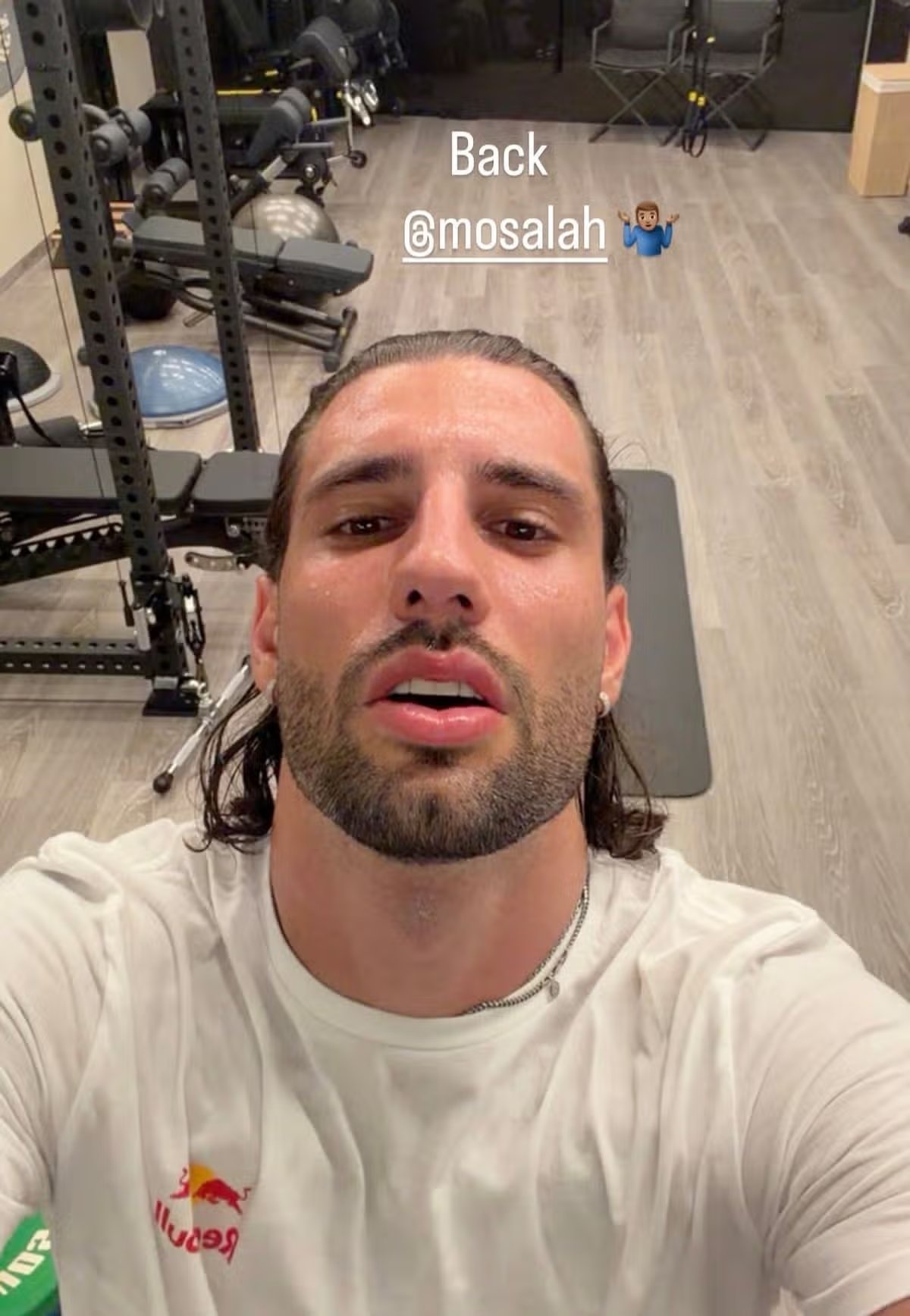 Dominik Szoboszlai takes a call from Mohamed Salah as the