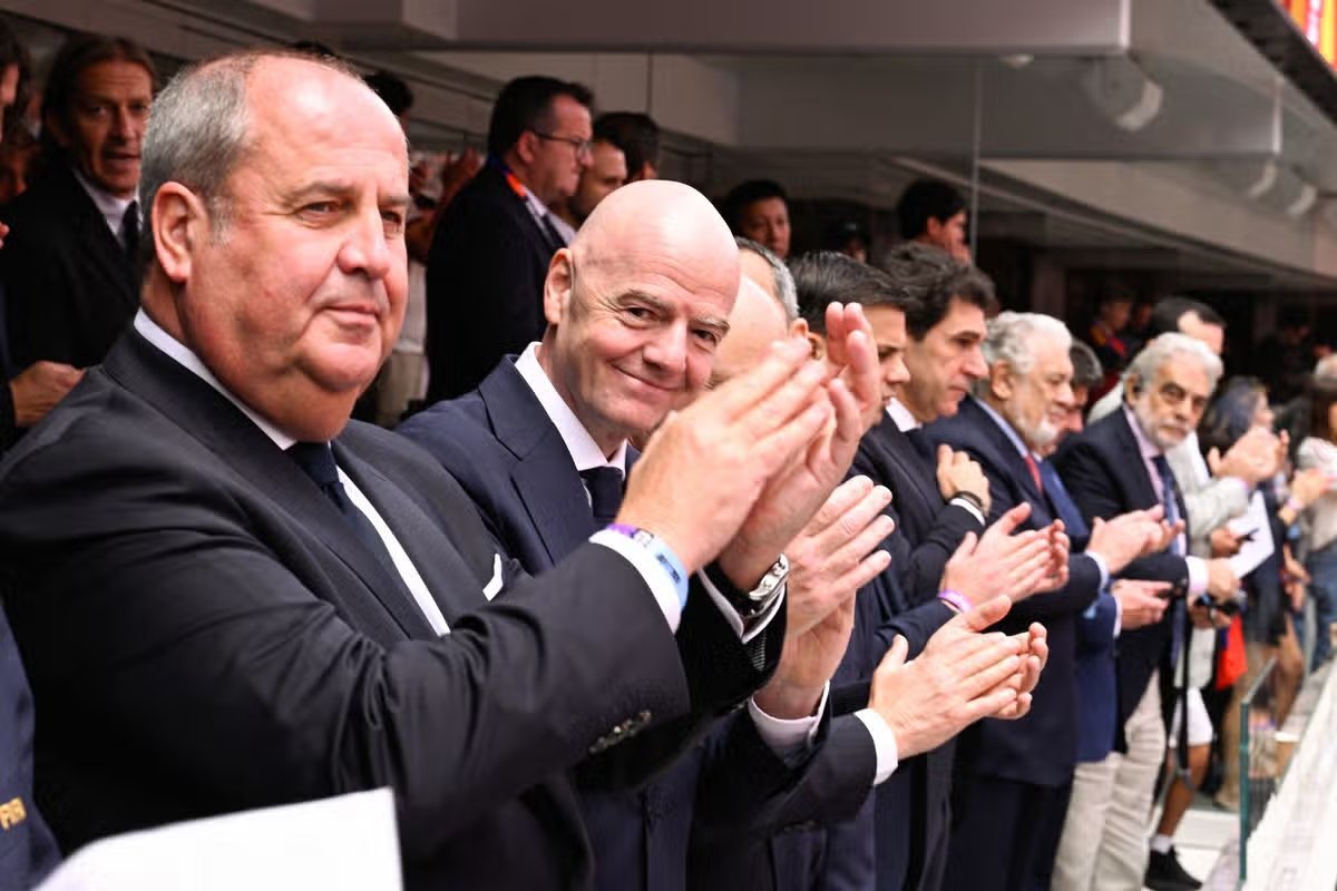 Donald Trump gets a warning after Gianni Infantino appears on the big screen 12 FIFA President Gianni Infantino was in the penalty area watching Spain's match against Austria.
